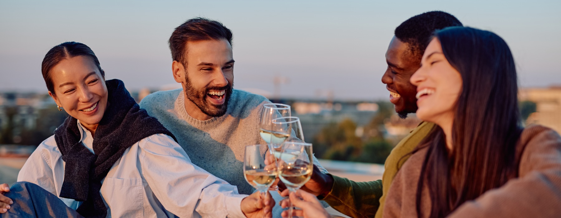 friends cheers outside together