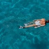 a person swimming in a pool