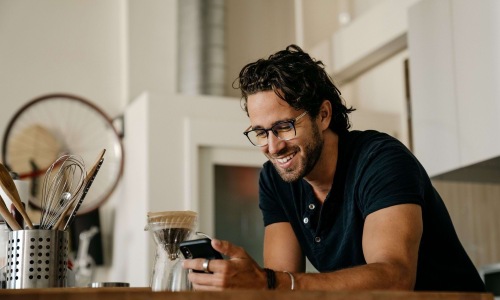 a man holding a phone